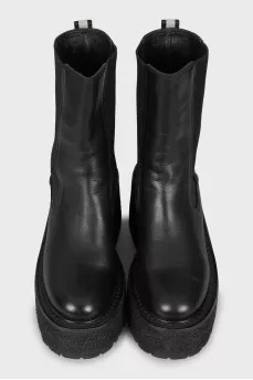 Leather boots with a massive wedge heel