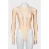 Beige bodysuit with transparent inserts