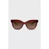 Sunglasses with red frames