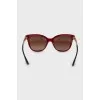 Sunglasses with red frames