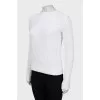 Knitted sweater cropped at the back