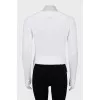Knitted sweater cropped at the back