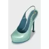 Open heel patent leather shoes