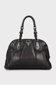 Leather bag with silver logo