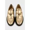 Gold leather loafers