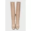Beige leather boots