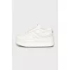 White high-heeled sneakers