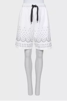 Shorts decorated with eyelets