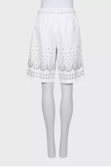 Shorts decorated with eyelets
