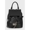 Leather backpack decorated with chain