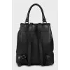 Leather backpack decorated with chain