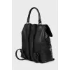 Leather backpack decorated with chain