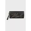 Leather clutch with metal logo