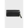 Leather clutch with metal logo