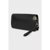 Leather clutch with metal logo