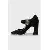 Suede shoes with silver logo