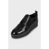 Insulated black brogues