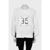 Sweatshirt with raised print