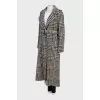 Coat with a belt in houndstooth print