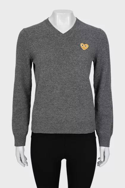 Gray V-neck sweater