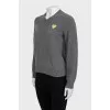 Gray V-neck sweater