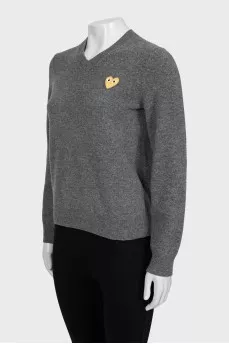 Gray V-neck sweater