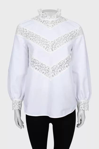 White blouse decorated with lace