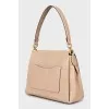 Beige leather crossbody bag