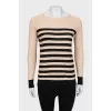 Beige jumper with black stripes