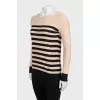 Beige jumper with black stripes