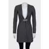 Fitted coat with a skull on the back