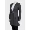 Fitted coat with a skull on the back
