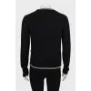 Black cardigan decorated with chain