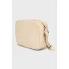 Beige leather crossbody bag