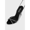 Suede sandals decorated with rhinestones