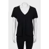 Black top with ripped effect