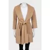 Cropped coat with a belt