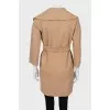 Cropped coat with a belt
