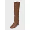 Insulated boots with wooden heels