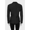 Jacket in small print with brooch