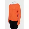Orange knitted sweater