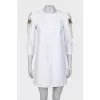 Mini dress with decorative shoulders