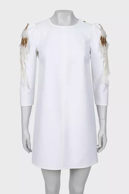 Mini dress with decorative shoulders