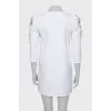Mini dress with decorative shoulders