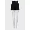 Black shorts with tag