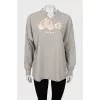 Long sleeve with torn effect