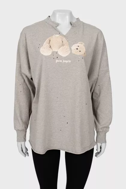 Long sleeve with torn effect