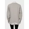 Long sleeve with torn effect