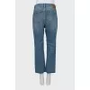 Button-down jeans with raw hem