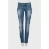 Low-rise embellished jeans